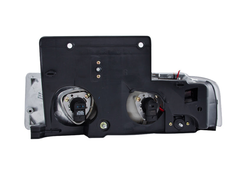 ANZO Crystal Headlights for 1995-2005 Chevrolet Astro Van with clear lens and chrome housing.