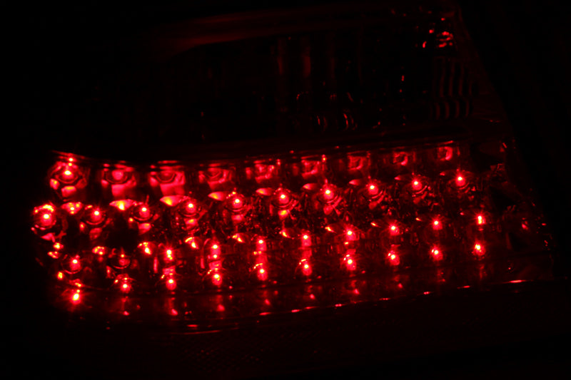 ANZO LED taillights for 1996-2002 Mercedes Benz E Class, featuring a red and clear lens design for improved visibility and modern aesthetics.