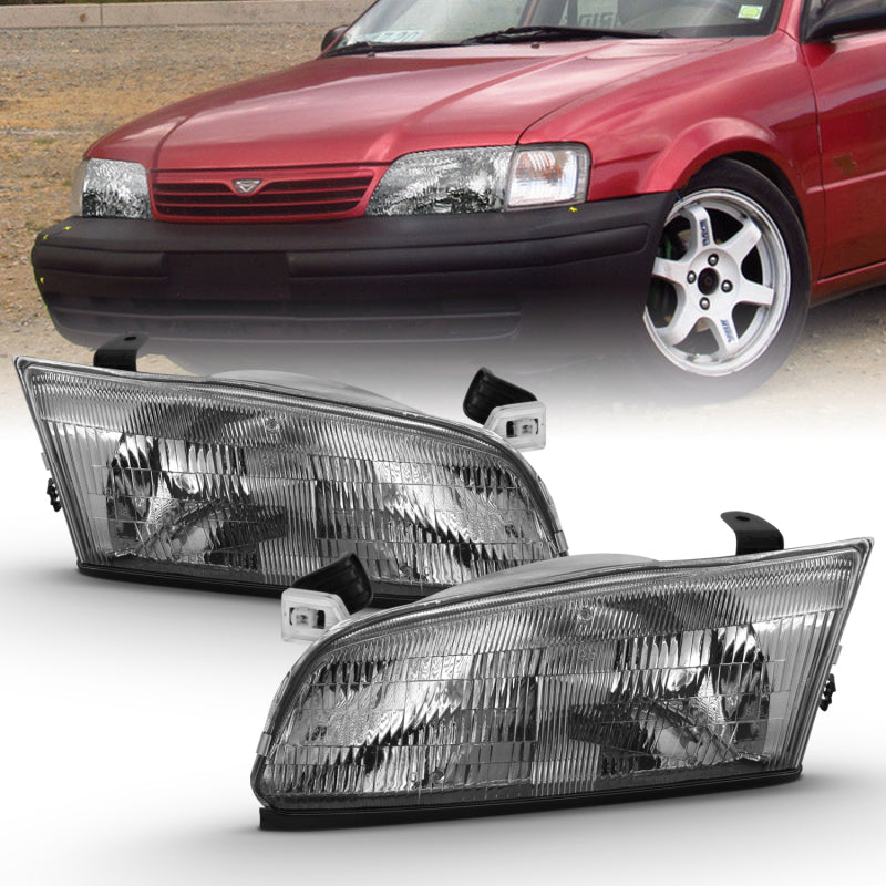 ANZO Crystal Headlight for 1997-1999 Toyota Camry featuring chrome and amber design, enhancing visibility and style.