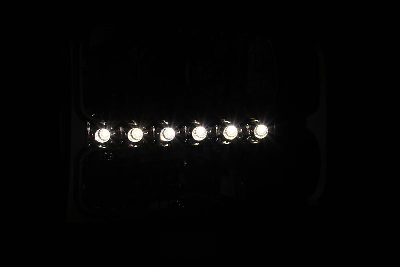 ANZO Crystal Headlight for 1997-1999 Toyota Camry featuring chrome and amber design, enhancing visibility and style.