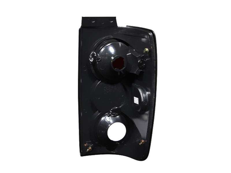 ANZO 1997-2002 Ford Expedition taillights with smoke lens, showcasing a sleek design for improved vehicle aesthetics.