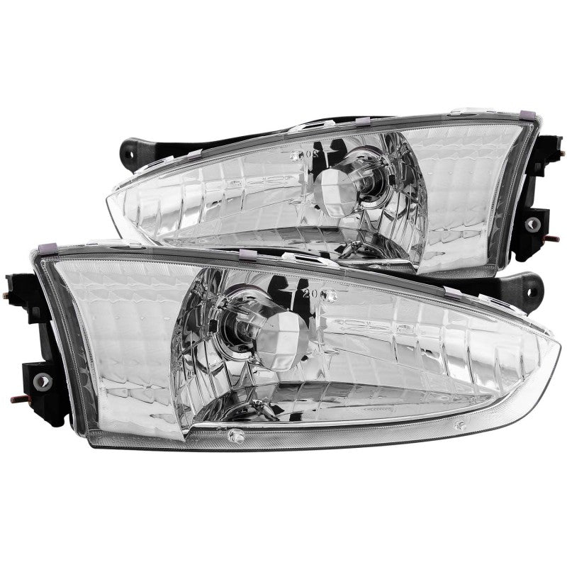 ANZO Crystal Headlights for 1997-2002 Mitsubishi Mirage with clear lens and chrome housing, showcasing sleek design and enhanced visibility.