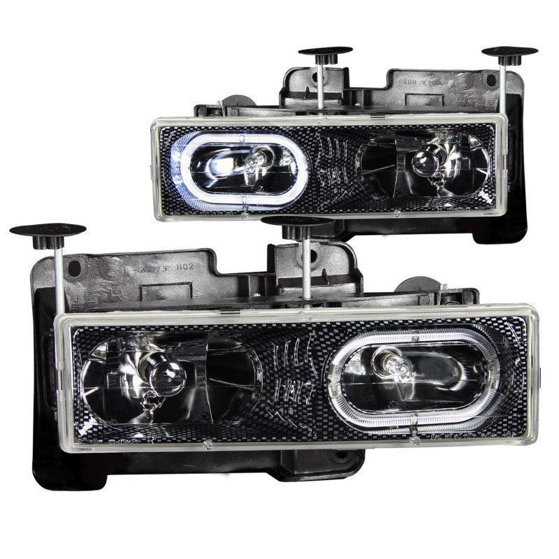 ANZO 1988-1998 Chevrolet C1500 Crystal Headlights featuring carbon housing and halo design, enhancing vehicle appearance and visibility.