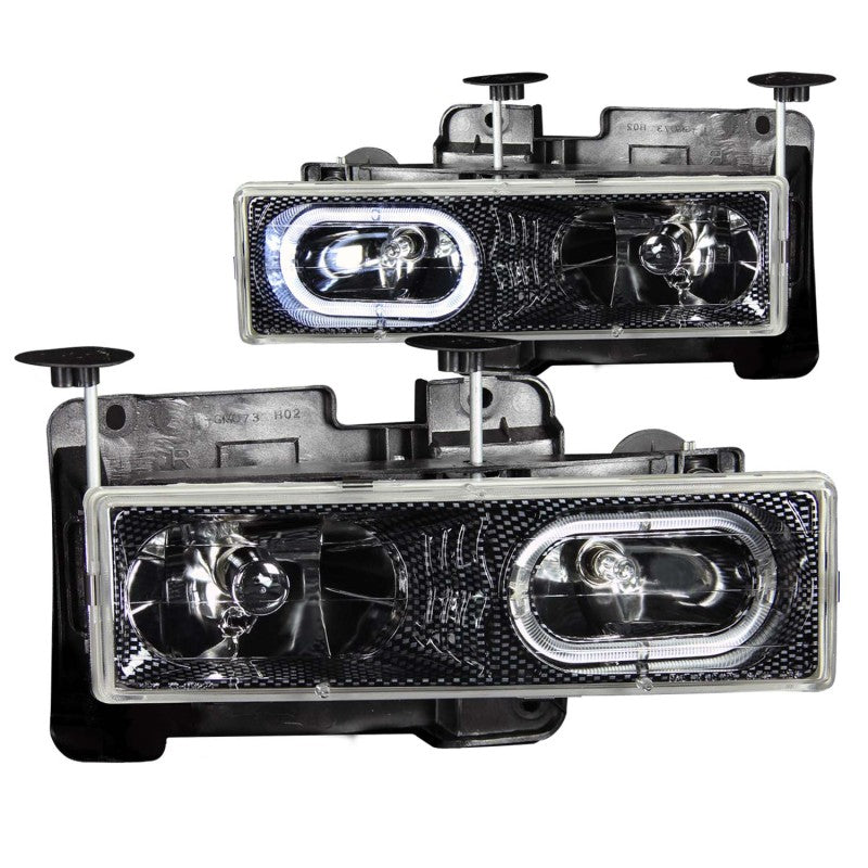 ANZO 1988-1998 Chevrolet C1500 Crystal Headlights featuring carbon housing and halo design, enhancing vehicle appearance and visibility.