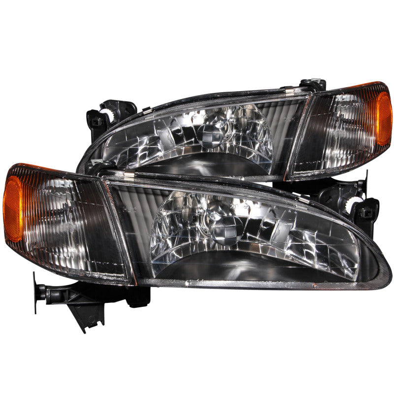 ANZO Crystal Headlights for 1998-2000 Toyota Corolla featuring clear lens and black housing, enhancing vehicle appearance and visibility.