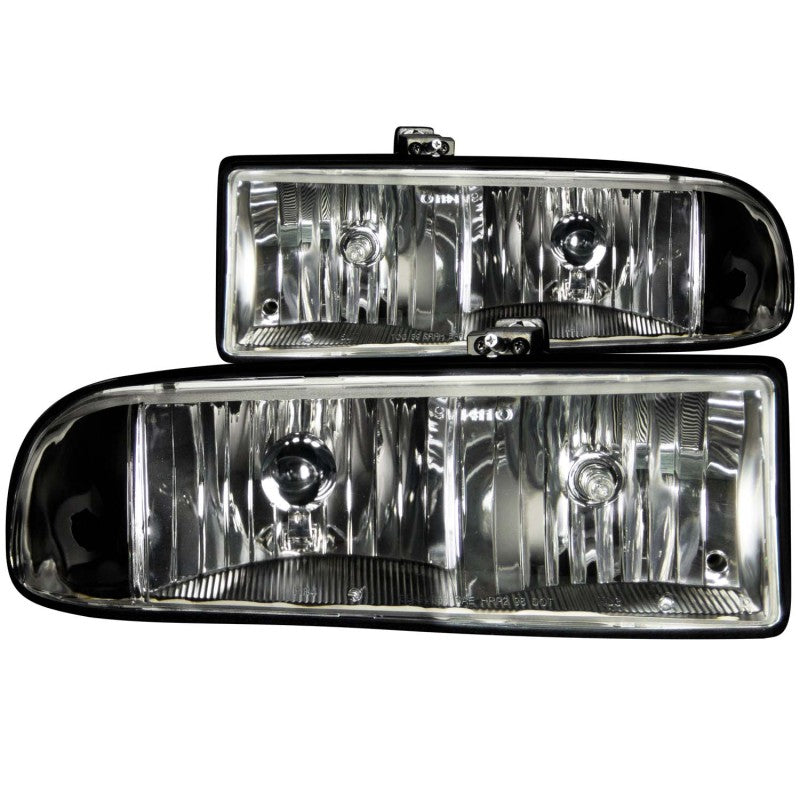 ANZO 1998-2005 Chevrolet S-10 Crystal Headlights with clear lens and black housing, showcasing modern design and enhanced visibility.