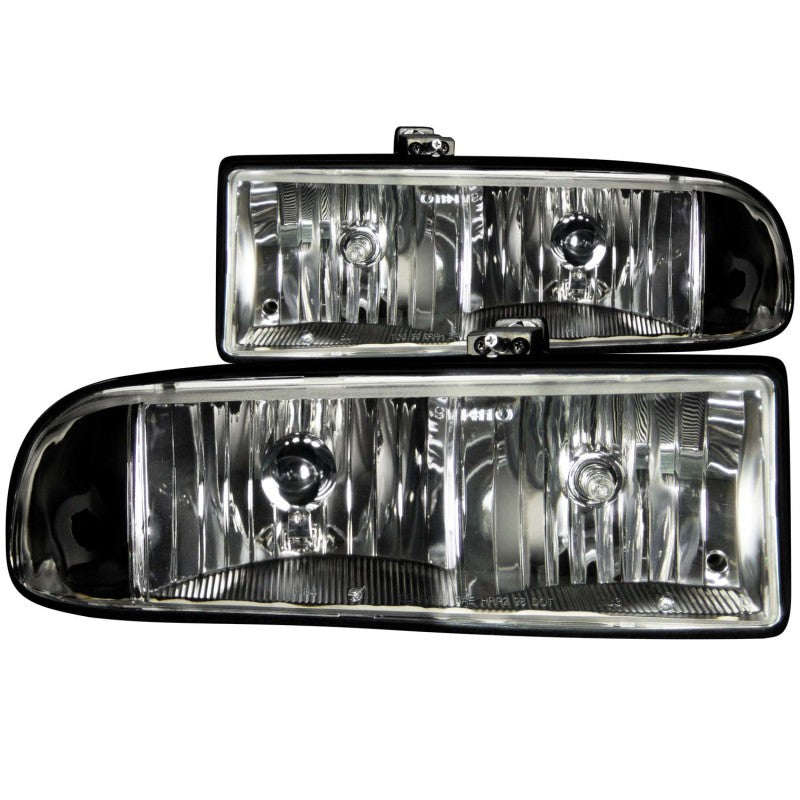 ANZO 1998-2005 Chevrolet S-10 Crystal Headlights with clear lens and black housing, showcasing modern design and enhanced visibility.