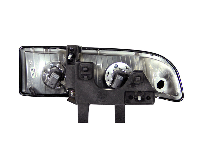 ANZO 1998-2005 Chevrolet S-10 Crystal Headlights with clear lens and black housing, showcasing modern design and enhanced visibility.