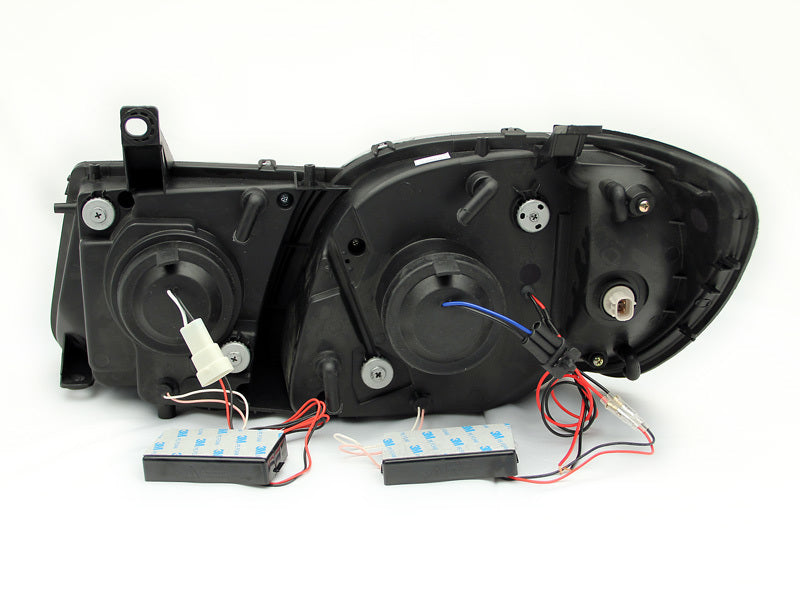 ANZO projector headlights with halo chrome design for 1998-2007 Lexus LX470, featuring clear lens and chrome housing.