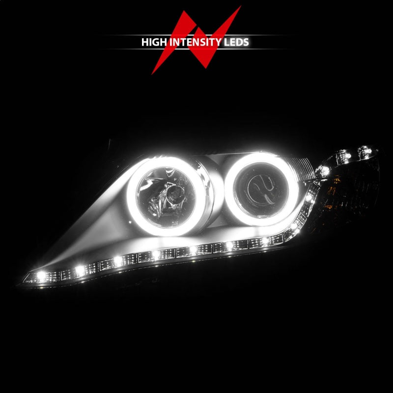 ANZO 2010-2011 Toyota Camry Projector Headlights with Halo in black housing, showcasing clear lens and stylish design.