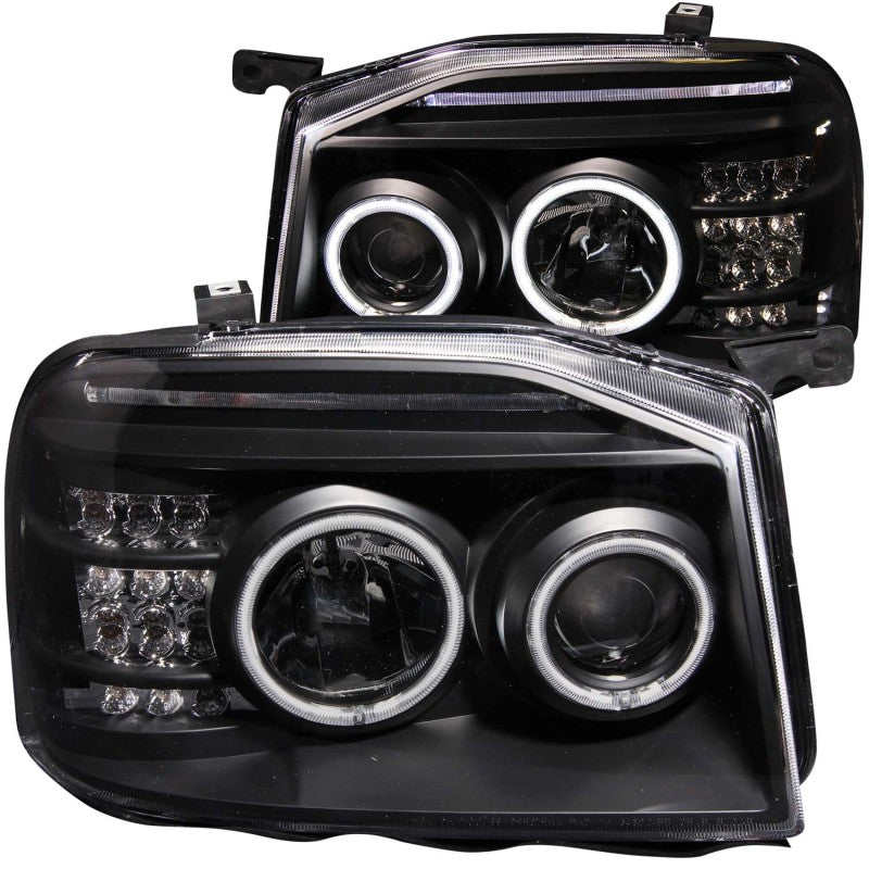 ANZO 2001-2004 Nissan Frontier Projector Headlights with Halo Black housing and clear lens, showcasing modern design and enhanced visibility.