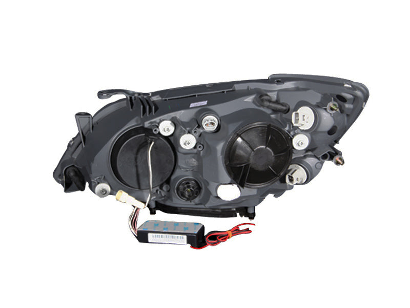 ANZO projector headlights for 2001-2005 Lexus IS300 with halo lights and black housing, showcasing modern design and clear lens.