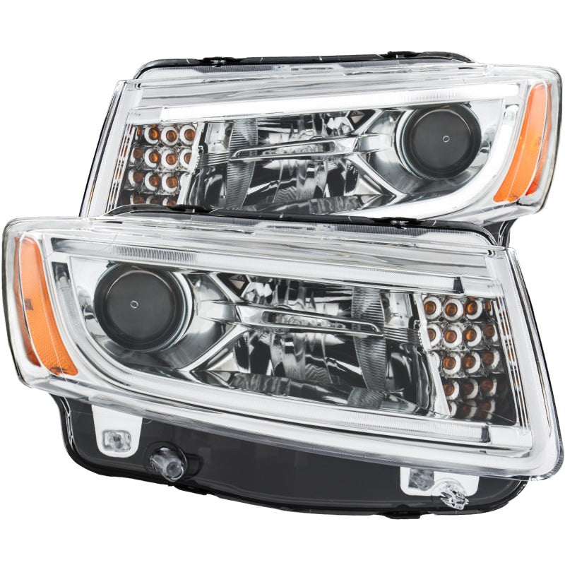 ANZO 2014-2015 Jeep Grand Cherokee projector headlights with plank style design, showcasing sleek and modern aesthetics.