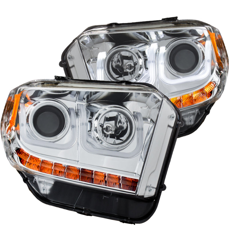 ANZO 2014-2015 Toyota Tundra projector headlights with U-Bar chrome design, showcasing clear lenses and chrome housing.