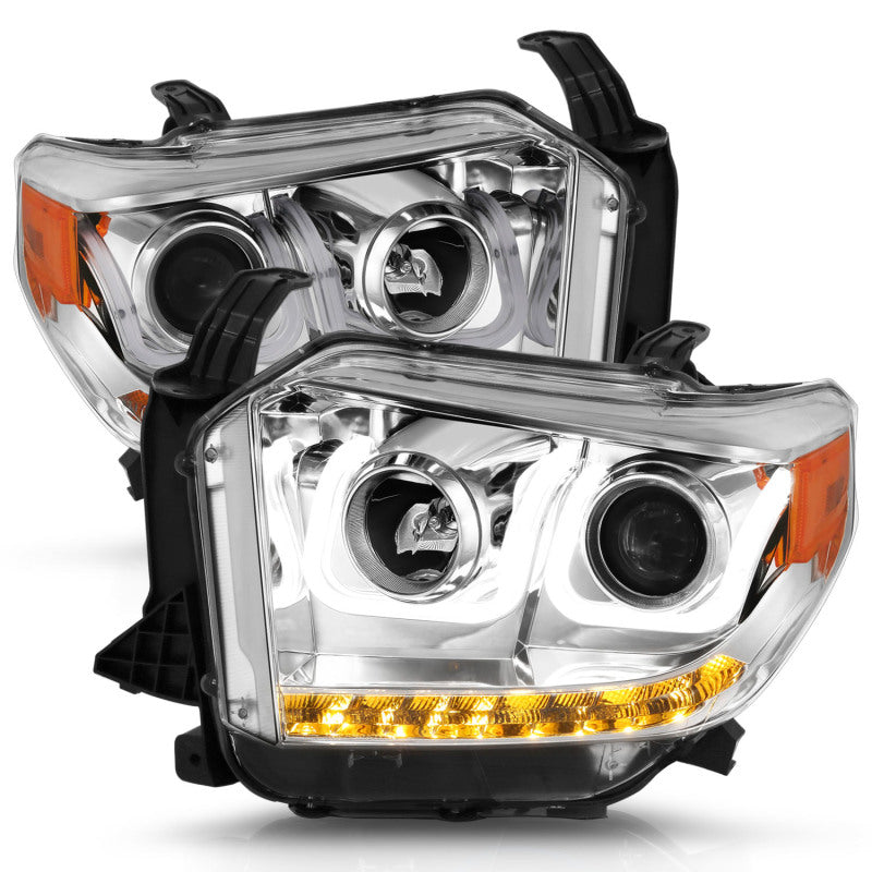 ANZO 2014-2015 Toyota Tundra projector headlights with U-Bar chrome design, showcasing clear lenses and chrome housing.
