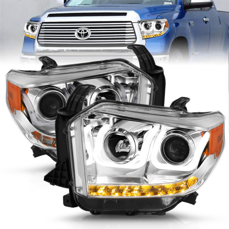 ANZO 2014-2015 Toyota Tundra projector headlights with U-Bar chrome design, showcasing clear lenses and chrome housing.