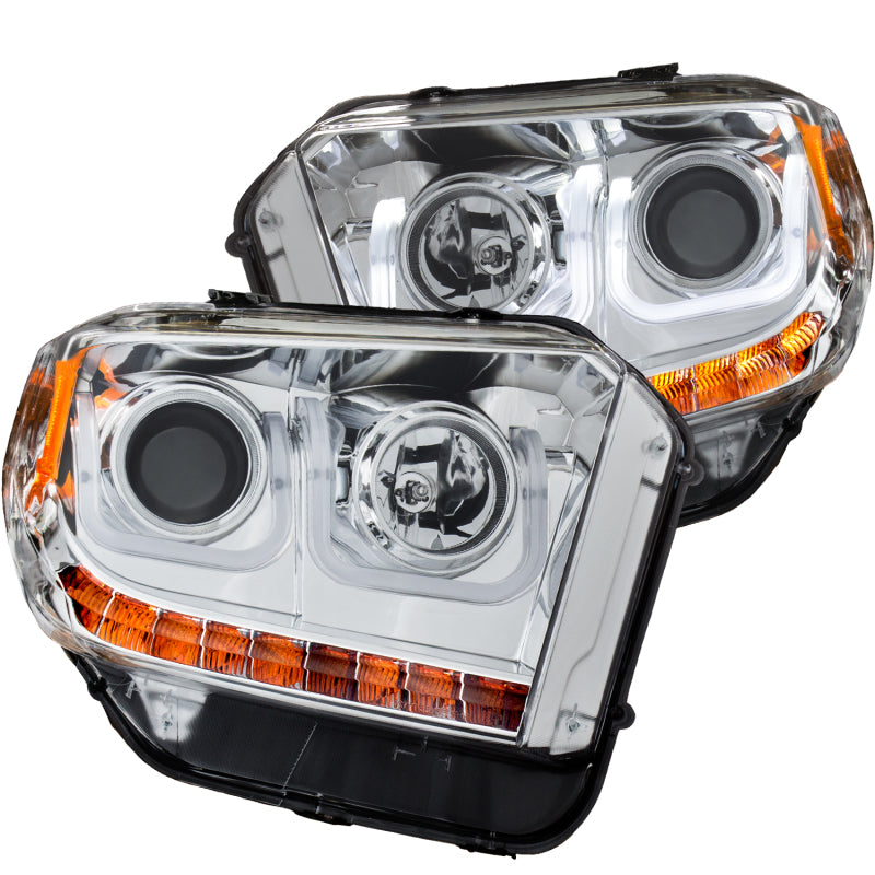 ANZO 2014-2015 Toyota Tundra projector headlights with U-Bar chrome design, showcasing clear lenses and chrome housing.