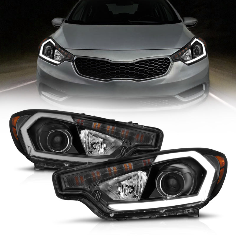 ANZO 2014-2016 Kia Forte projector headlights with light bar in sleek black housing, showcasing modern design and powerful light output.