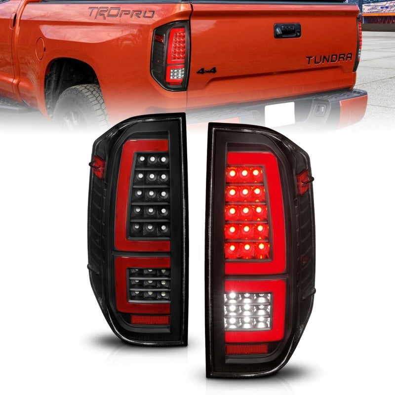 ANZO LED taillights for 2014-2021 Toyota Tundra featuring black housing and clear lens, enhancing vehicle visibility and style.