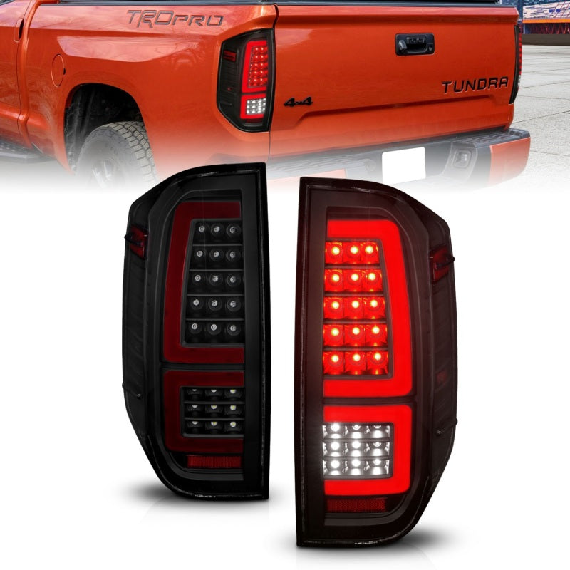 ANZO LED taillights for 2014-2021 Toyota Tundra featuring black housing and smoke lens, enhancing vehicle appearance and safety.