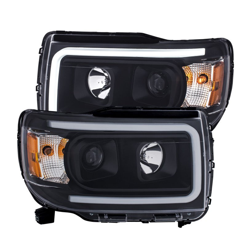 ANZO 2015+ GMC Canyon Projector Headlights with black housing and clear lens, showcasing a modern plank style design.