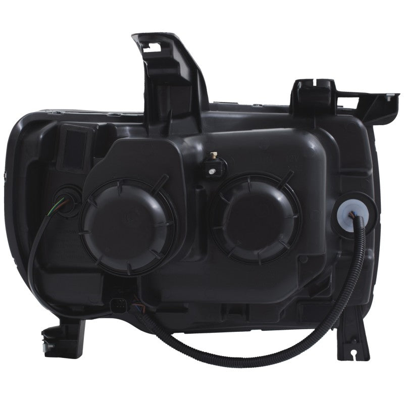 ANZO 2015+ GMC Canyon Projector Headlights with black housing and clear lens, showcasing a modern plank style design.