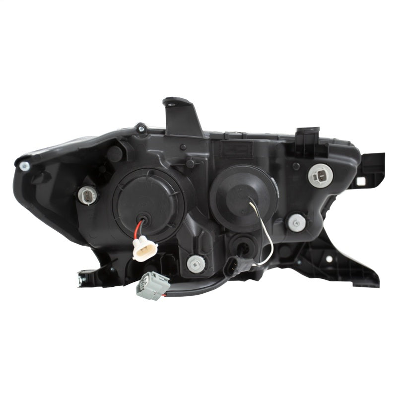 ANZO 2016-2017 Toyota Tacoma Projector Headlights with plank style switch, showcasing modern design and advanced lighting technology.