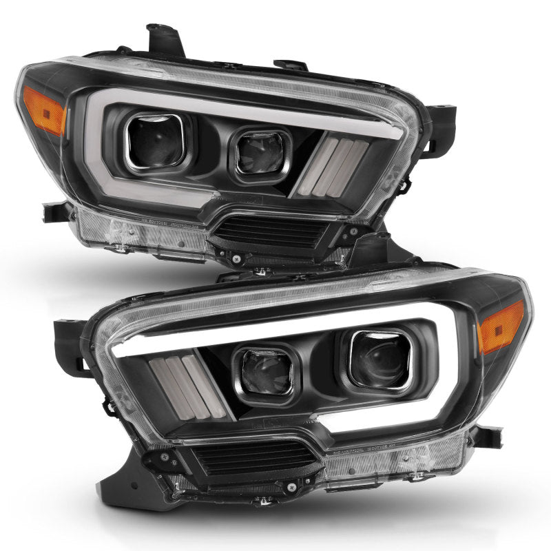 ANZO 2016-2017 Toyota Tacoma Projector Headlights with plank style switch, showcasing modern design and advanced lighting technology.