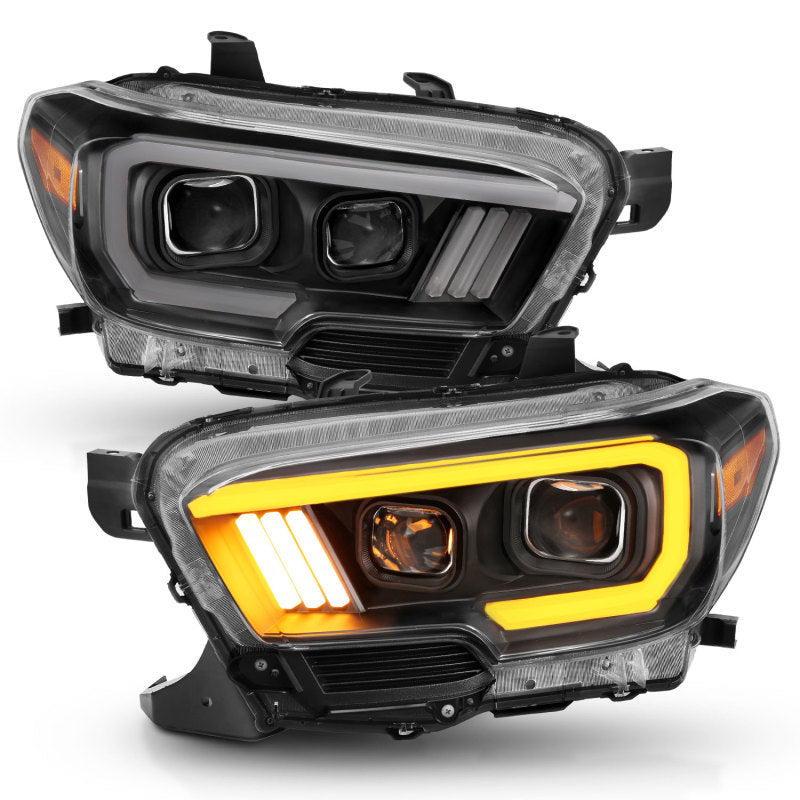 ANZO 2016-2017 Toyota Tacoma Projector Headlights with plank style switch, showcasing modern design and advanced lighting technology.