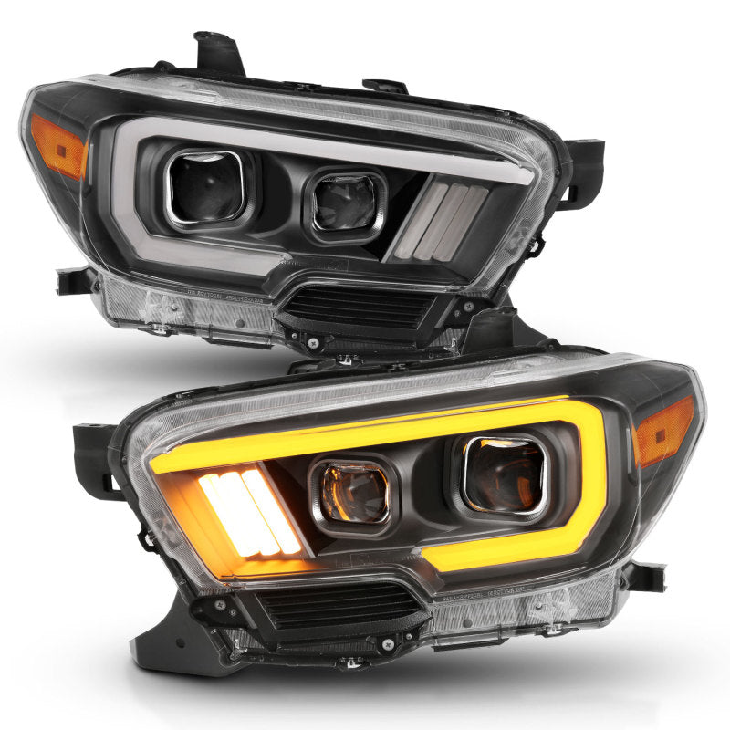 ANZO 2016-2017 Toyota Tacoma Projector Headlights with plank style switch, showcasing modern design and advanced lighting technology.