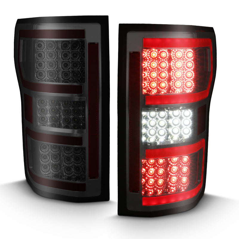 ANZO LED Taillight for 2018-2019 Ford F-150 featuring a smoke lens and red light bar, showcasing modern design and enhanced visibility.