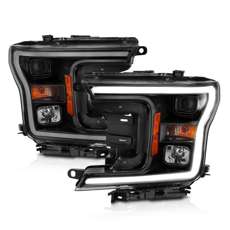 ANZO 2018-2019 Ford F-150 Projector Headlight Set with black housing and halo feature, showcasing modern design and clear lens.