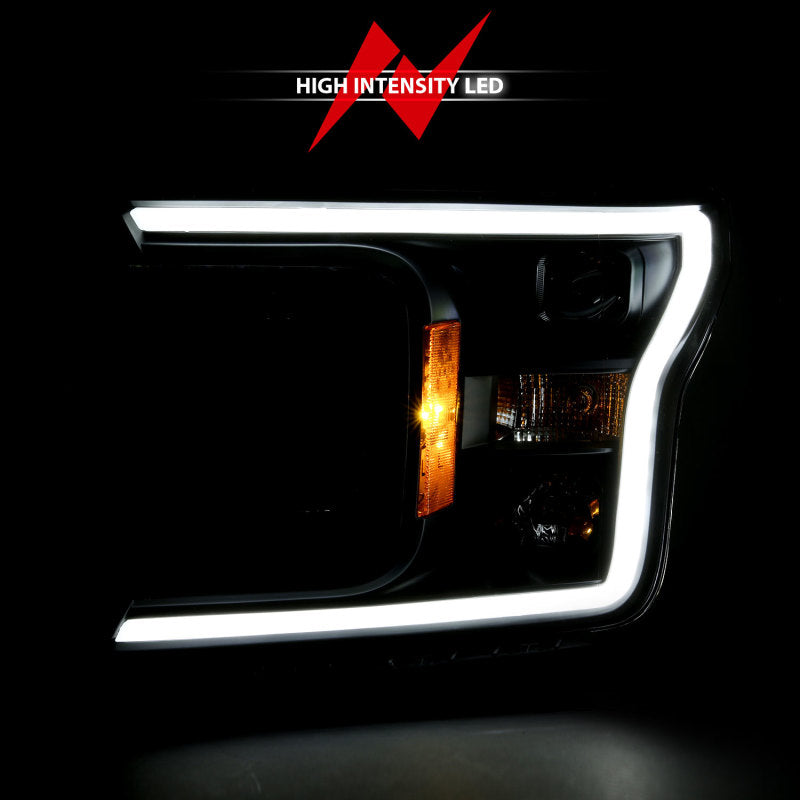 ANZO 2018-2019 Ford F-150 Projector Headlight Set with black housing and halo feature, showcasing modern design and clear lens.