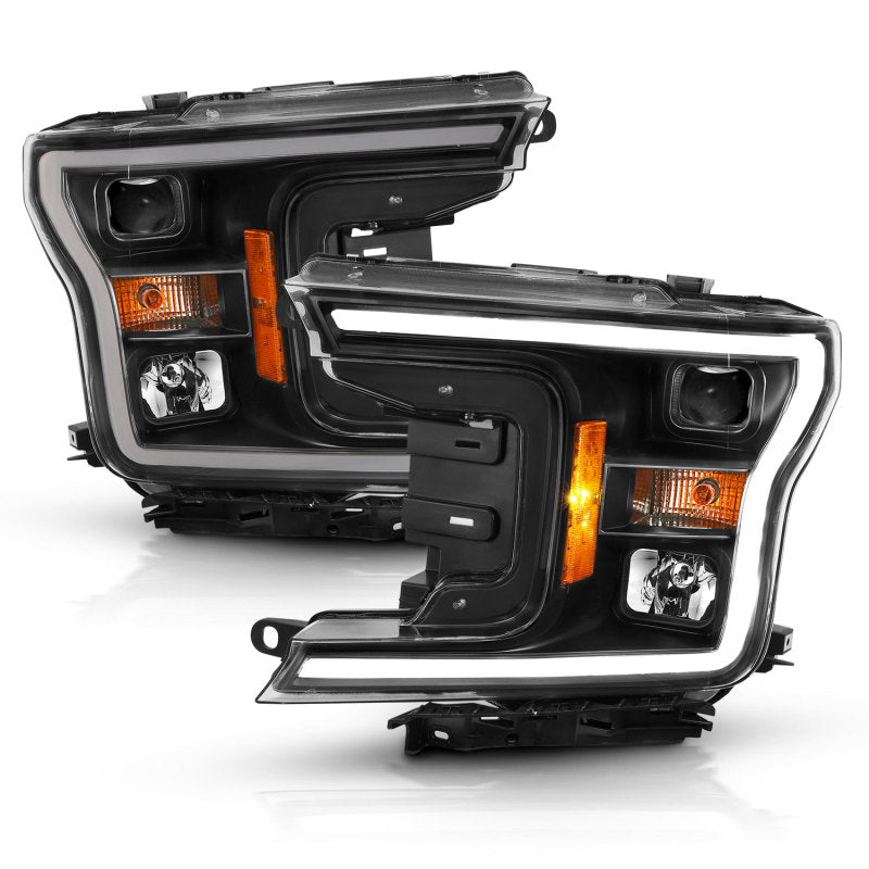 ANZO 2018-2019 Ford F-150 Projector Headlight Set with black housing and halo feature, showcasing modern design and clear lens.