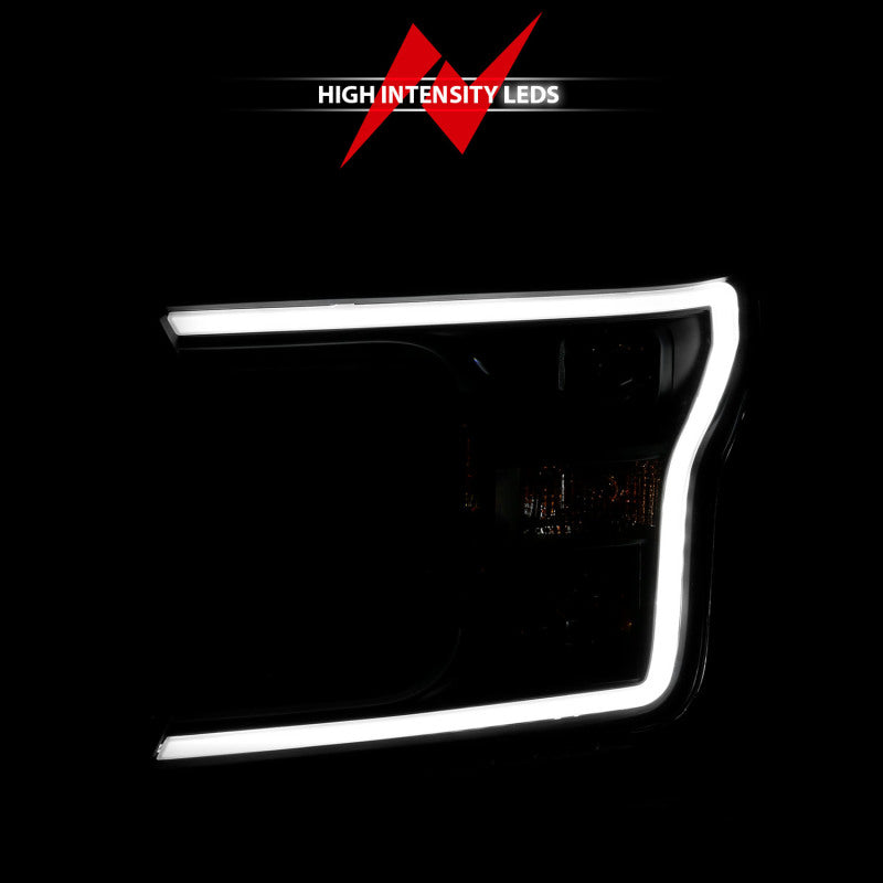 ANZO 2018-2019 Ford F-150 Projector Headlight Set with black housing and halo feature, showcasing modern design and clear lens.