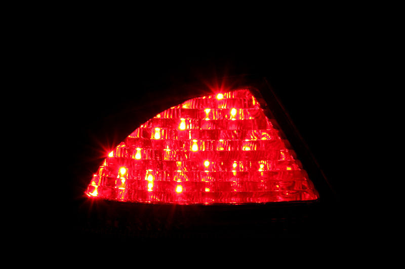 ANZO LED taillights for 2000-2005 Mercedes Benz S Class, featuring a red/smoke lens and red reflector for enhanced visibility and style.