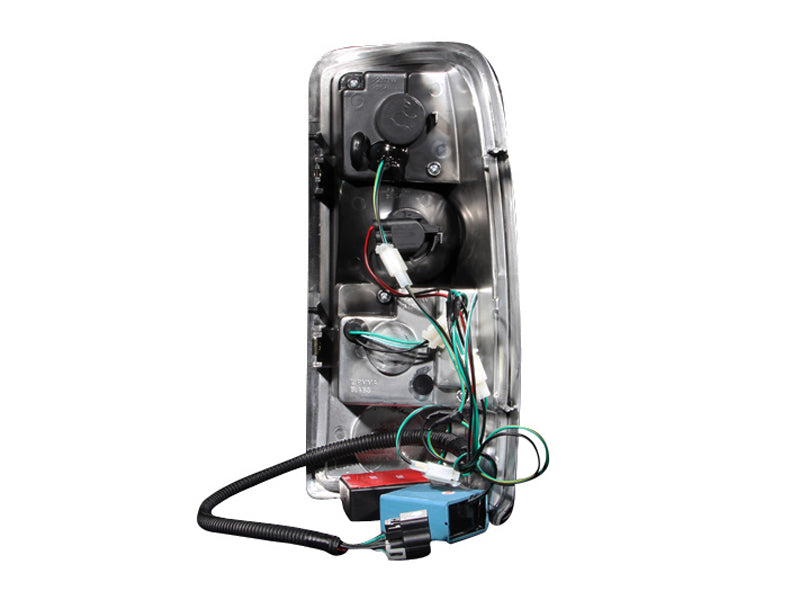 ANZO LED taillights for 2000-2006 Chevrolet Suburban with chrome housing and clear lens, showcasing modern design and enhanced visibility.