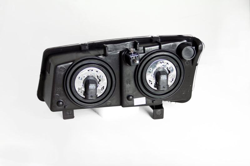 ANZO Crystal Headlights for 2003-2006 Chevrolet Silverado 1500 with clear lens and black housing, showcasing modern design and enhanced visibility.