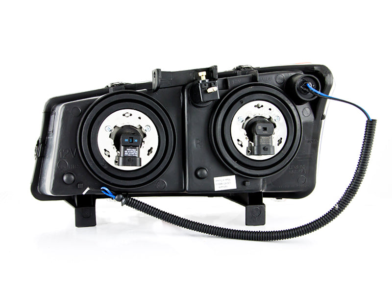 ANZO Crystal Headlights for 2003-2006 Chevrolet Silverado 1500 featuring Halo design and clear lens in black housing.