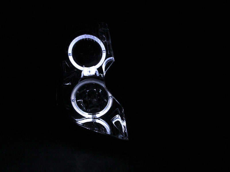 ANZO projector headlights with halo chrome for 2003-2007 Cadillac CTS, featuring clear lens and chrome housing.