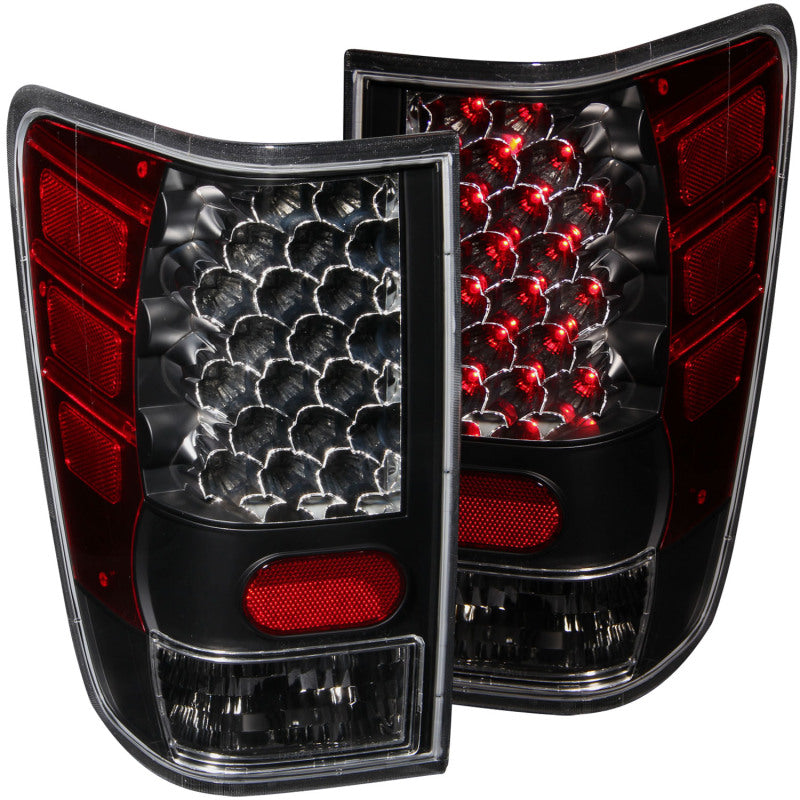 ANZO 2004-2015 Nissan Titan LED Taillights in black housing with clear lens, showcasing modern design and bright LED lights.