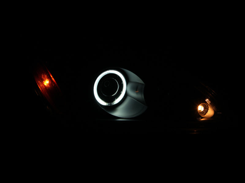 ANZO 2004-2007 Mitsubishi Lancer Projector Headlights with Halo design in black housing, showcasing clear lens and stylish appearance.