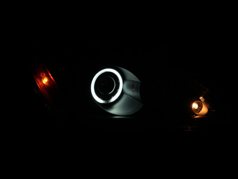 ANZO 2004-2007 Mitsubishi Lancer Projector Headlights with Halo design in black housing, showcasing clear lens and stylish appearance.