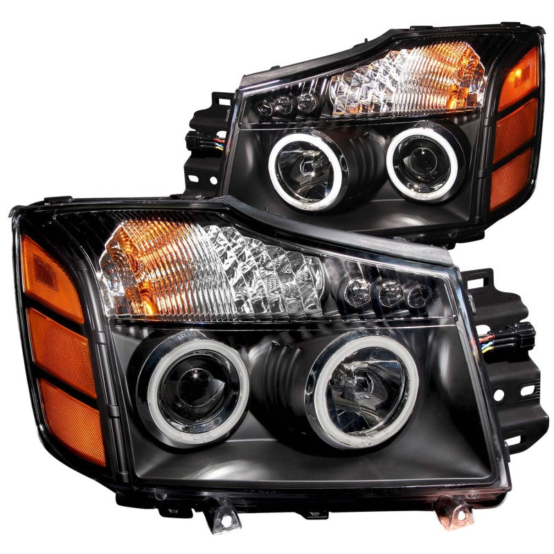 ANZO 2004-2007 Nissan Armada Projector Headlights with Halo Black CCFL, featuring sleek black housing and clear lens for enhanced visibility.