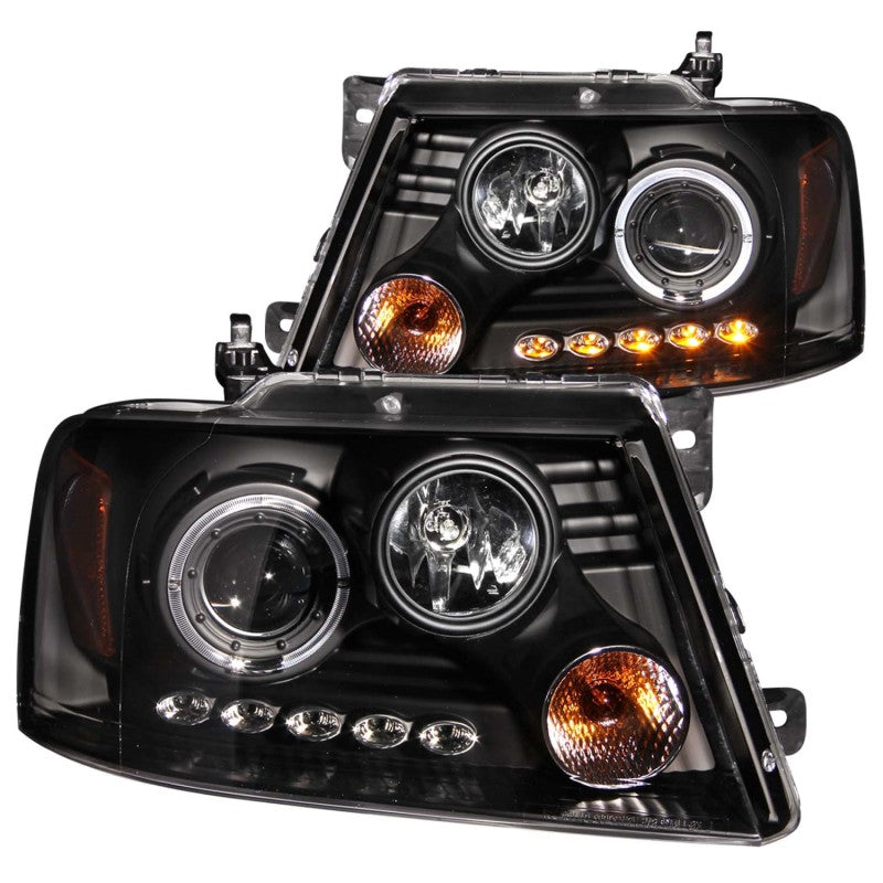ANZO 2004-2008 Ford F-150 projector headlights with halo and LED lights, featuring a sleek black housing and clear lens design.
