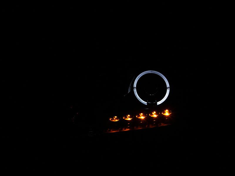 ANZO 2004-2008 Ford F-150 projector headlights with halo and LED lights, featuring a sleek black housing and clear lens design.