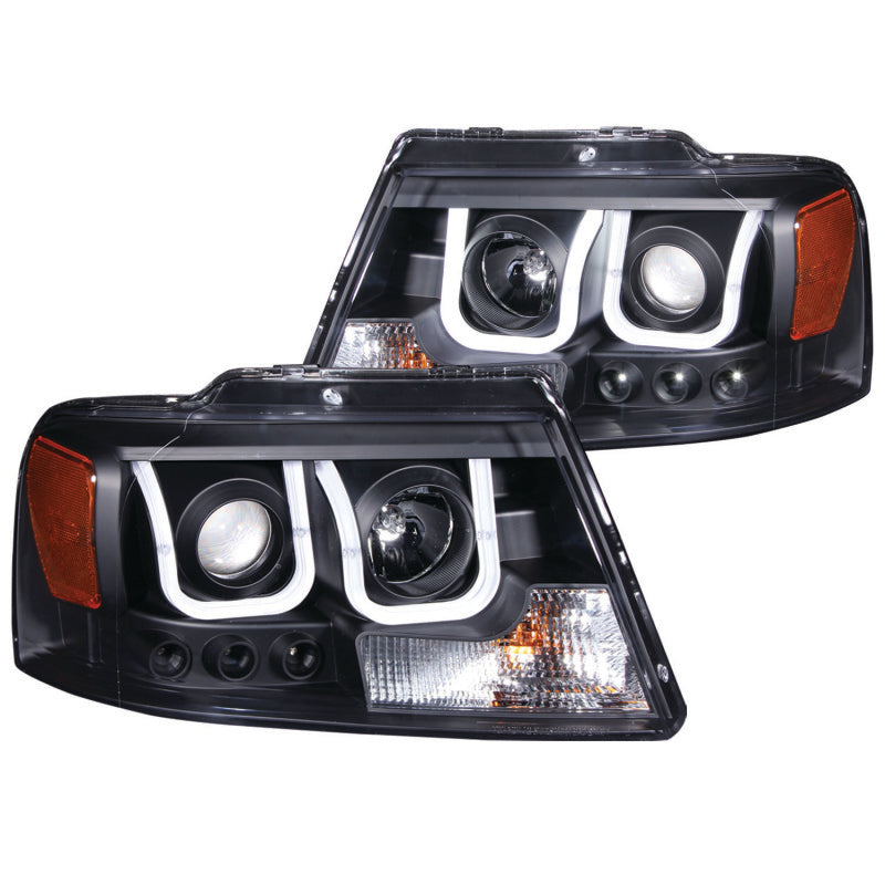 ANZO 2004-2008 Ford F-150 projector headlights with U-Bar black housing, showcasing clear lens and modern design.