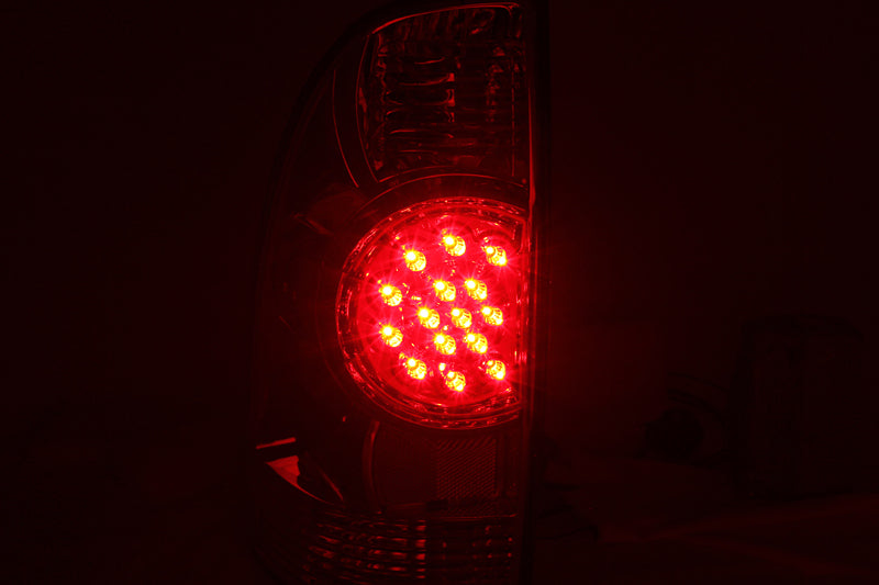 ANZO LED taillights for 2005-2015 Toyota Tacoma with chrome housing and clear lens.