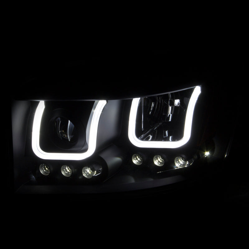 ANZO 2006-2008 Dodge Ram 1500 Projector Headlights with U-Bar in black housing, showcasing clear lens design.