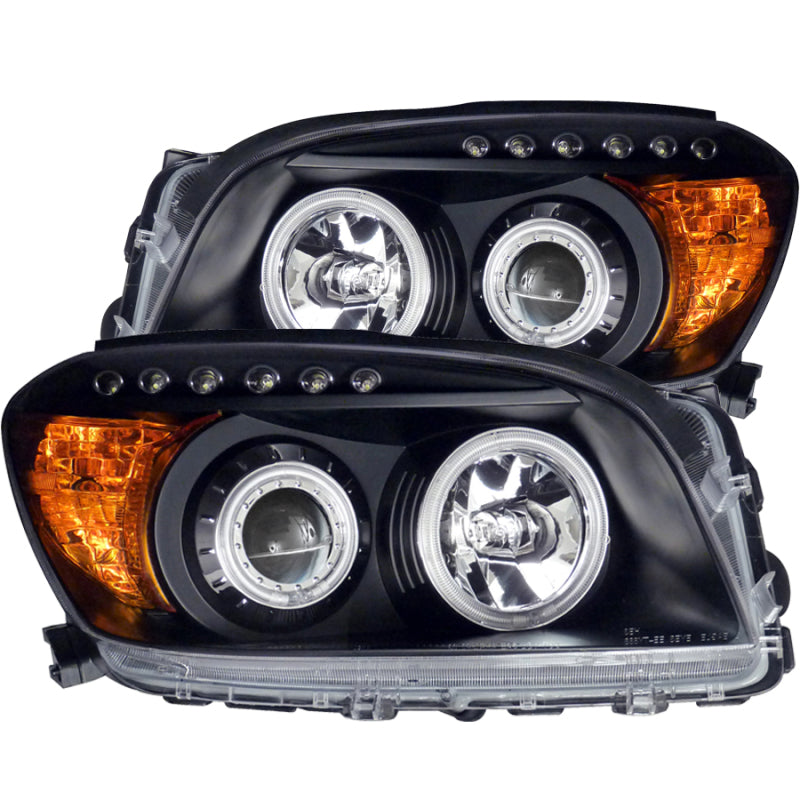 ANZO projector headlights with halo design for 2006-2008 Toyota Rav4, featuring a sleek black finish and clear lens.